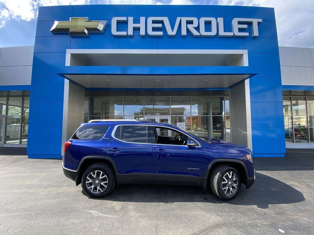 2023 GMC Acadia SLE in Ultra Blue Metallic — front three-quarter view