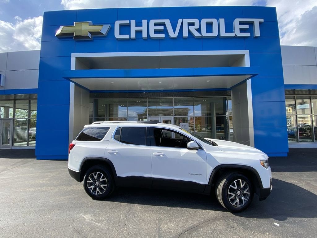 2023 GMC Acadia SLE in Summit White — front three-quarter view
