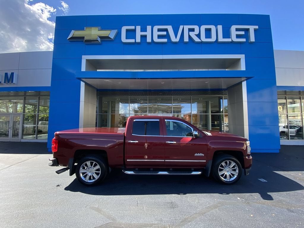 2017 Chevrolet Silverado 1500 High Country in Siren Red Tintcoat — front three-quarter view